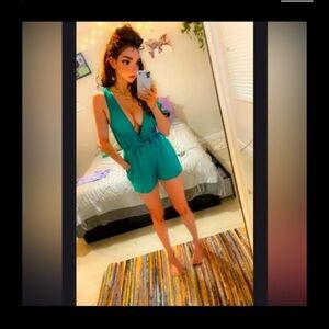 Dark, bright green romper pairs, well with undergarments, as well as a shawl etc